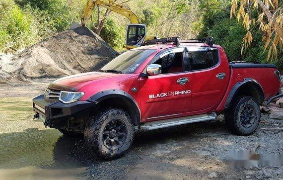 Red Mitsubishi Strada 2012 Automatic Diesel for sale 