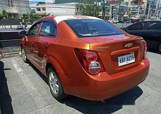 Orange Chevrolet Sonic 2015 at 30303 km for sale 