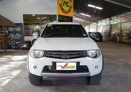 Selling White Mitsubishi Strada 2013 Manual Diesel at 51000 km 