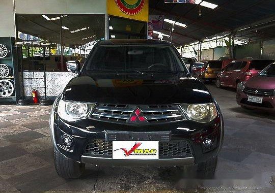 Black Mitsubishi Strada 2011 at 71000 km for sale 