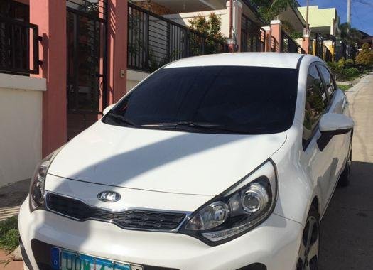 Selling 2013 Kia Rio Hatchback for sale in Davao City