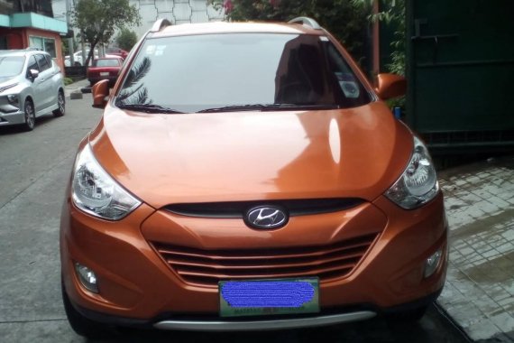 Orange Hyundai Tucson 2013 at 40000 km for sale 