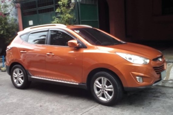 Orange Hyundai Tucson 2013 at 40000 km for sale 