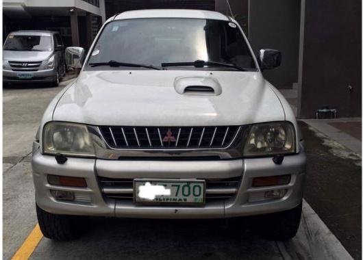 White Mitsubishi Strada 2001 for sale in Quezon City