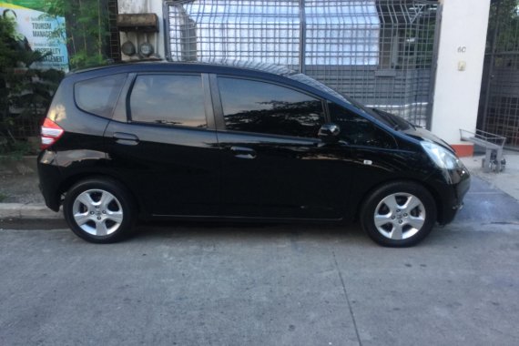 Black Honda Jazz 2010 at 69700 km for sale 