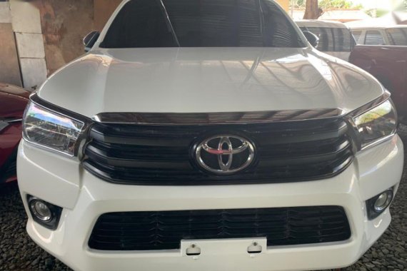 White Toyota Hilux 2016 Manual Diesel for sale in Quezon City