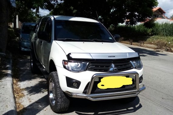 Selling Mitsubishi Strada 2014 Truck in Cavite 