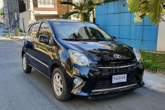 Black 2016 Toyota Wigo Automatic at 25000 km for sale 