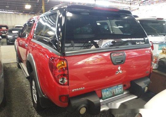 Red Mitsubishi Strada 2013 at 79025 km for sale in Quezon City