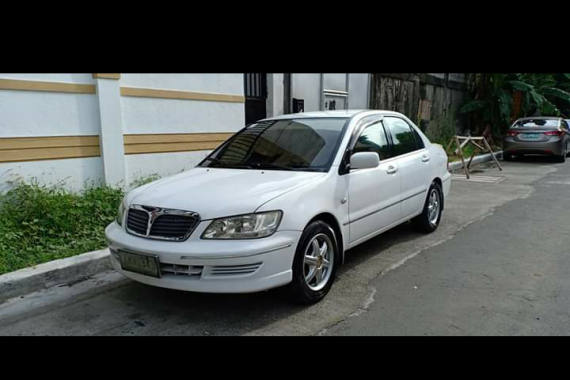 Selling White Mitsubishi Lancer 2003 Sedan in Tarlac 