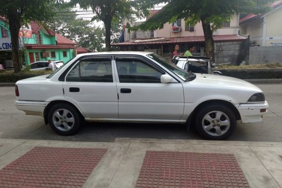 White Toyota Corolla 1991 Sedan Manual at 170786 km for sale 