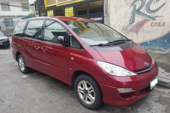 Red 2005 Toyota Previa at 95000 km for sale in Makati 