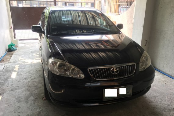 Black 2007 Toyota Corolla Altis at 119000 km for sale 