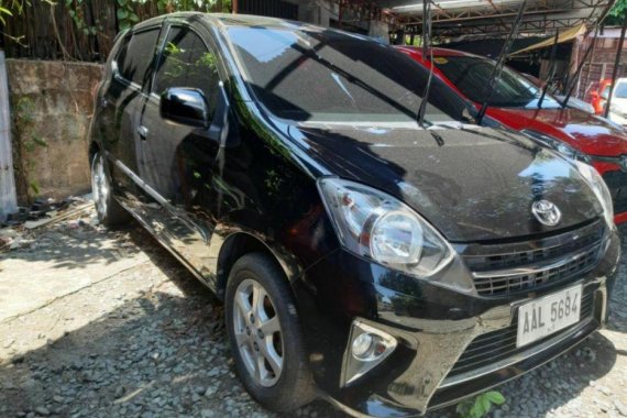 Sell Black 2014 Toyota Wigo in Quezon City