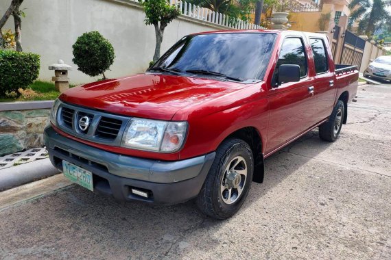 Red 2005 Nissan Frontier at 120000 km for sale in Cebu 