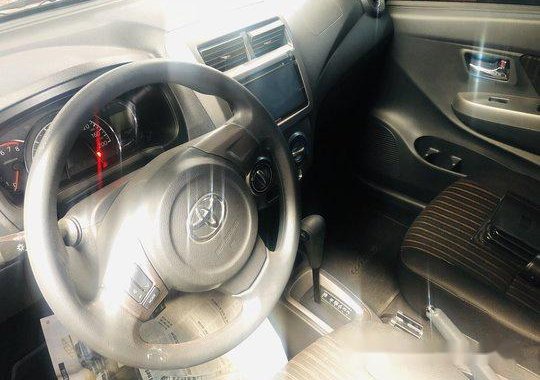 Orange Toyota Wigo 2018 for sale in Quezon City 