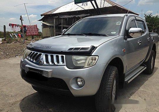 Silver Mitsubishi Strada 2007 at 98000 km for sale