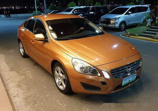 Orange Volvo S60 2011 Automatic Gasoline for sale