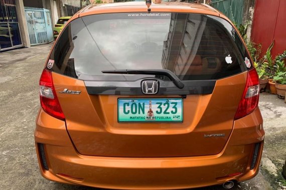 Selling Orange Honda Jazz 2013 Hatchback Automatic Gasoline 