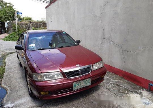 Red Nissan Sentra 2000 at 118000 km for sale