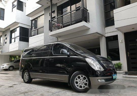 Black Hyundai Grand Starex 2014 at 47000 km for sale