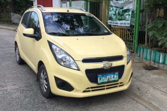 Yellow Chevrolet Spark 2013 Hatchback for sale in Manila 