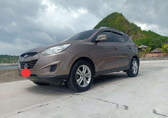 Sell Brown 2011 Hyundai Tucson at 60000 km