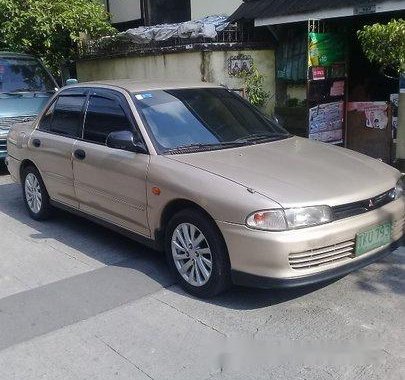 Beige Mitsubishi Lancer 1993 Manual Gasoline for sale