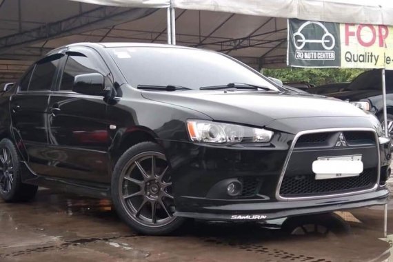 Black 2014 Mitsubishi Lancer Ex for sale in Makati 