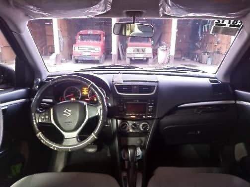 Selling Red Suzuki Swift 2015 at 25000 km 