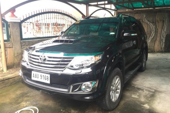 Selling Black Toyota Fortuner 2014 at 34000 km 