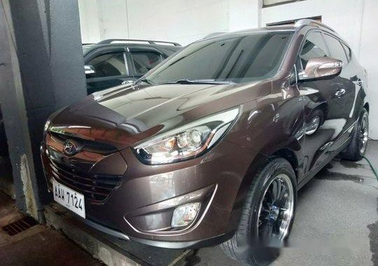 Brown Hyundai Tucson 2014 for sale in Quezon City 