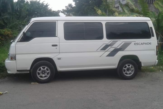 Selling White Nissan Urvan Escapade 2013 Van in Bulacan 