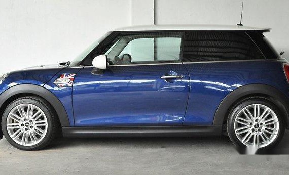Selling Blue Mini Cooper 2015 at 18000 km 