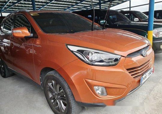 Orange Hyundai Tucson 2014 Automatic Gasoline for sale