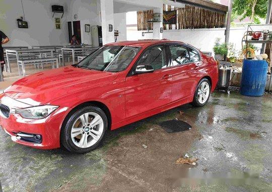 Red Bmw 320D 2013 at 19500 km for sale 