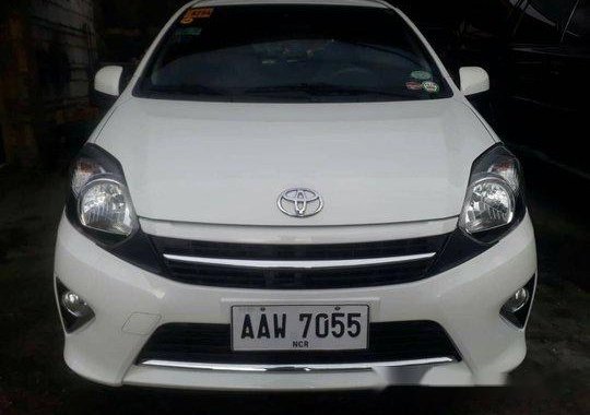 Selling White Toyota Wigo 2014 Automatic Gasoline at 33919 km