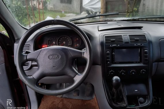 Selling Red Kia Carnival 2003 Manual Diesel in Baguio 