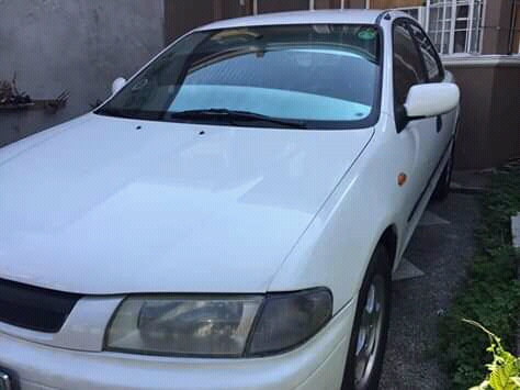White 1998 Mazda 323 for sale in Quezon City 