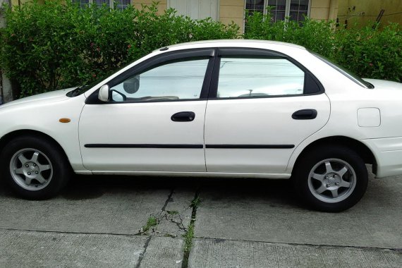 White 1998 Mazda 323 for sale in Quezon City 