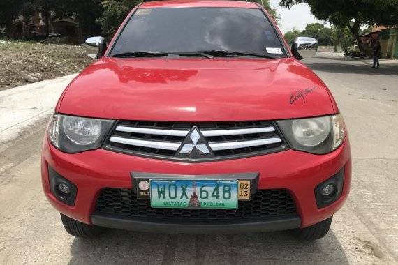 Red 2013 Mitsubishi Strada Truck at 24000 km for sale 