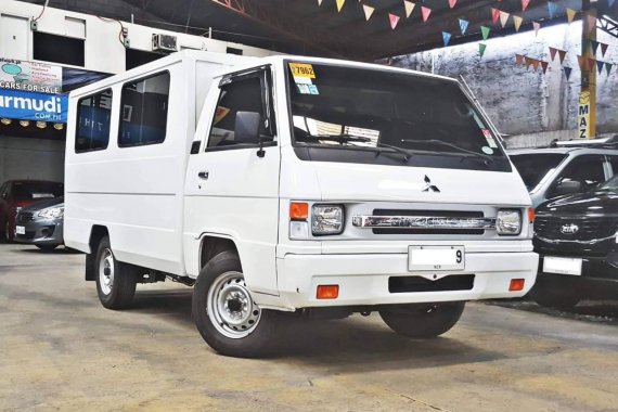 Sell White 2015 Mitsubishi L300 at 13000 km in Quezon City 