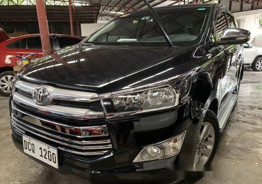 Selling Black Toyota Innova 2016 at 18000 km