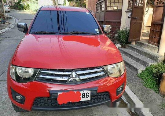 Sell Red 2014 Mitsubishi Strada at 92000 km