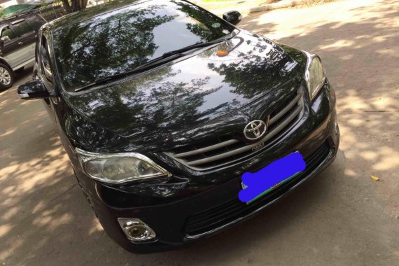 Selling Black Toyota Altis 2011 at 60000 km 