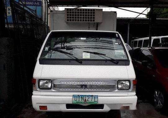 Selling White Mitsubishi L300 2012 in Caloocan