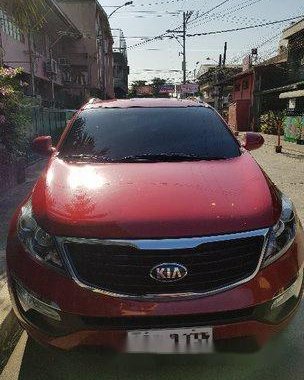 Selling Red Kia Sportage 2015 at 20000 km 