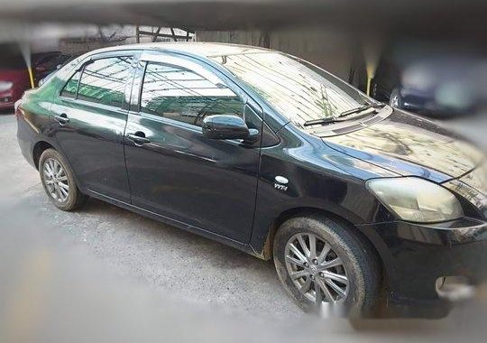 Black Toyota Vios 2013 at 70000 km for sale 