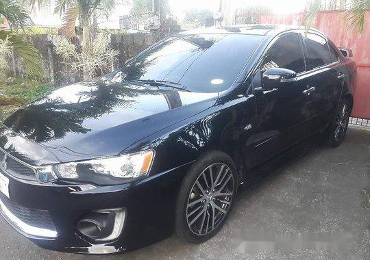 Black Mitsubishi Lancer Ex 2016 at 32000 km for sale 