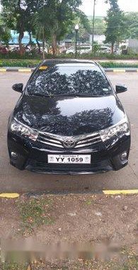Sell Black 2016 Toyota Corolla Altis at 13000 km 